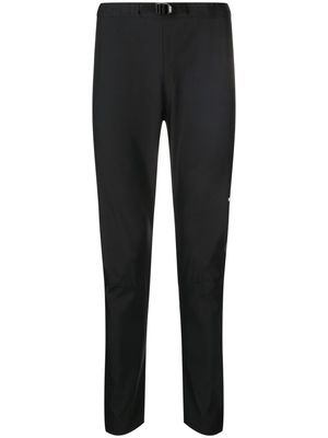 WTAPS Bend logo-print trousers - Black