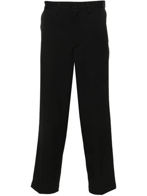 WTAPS logo-appliqué pressed-crease trousers - Black