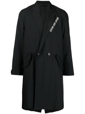 WTAPS slogan-print double-breasted coat - Black