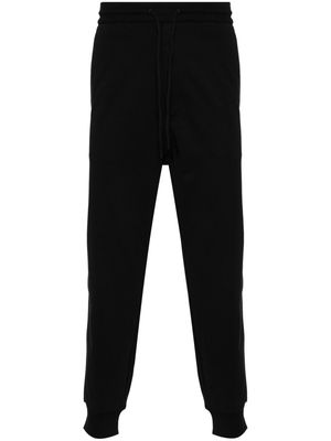 Y-3 logo-printed jersey trousers - Black
