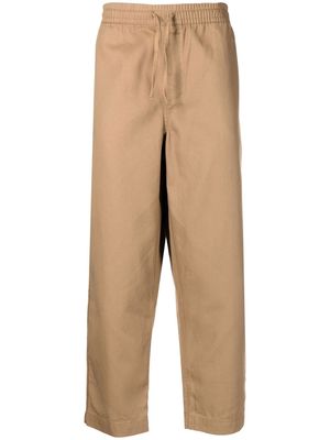 YMC x Umbro cropped tapered trousers - Brown