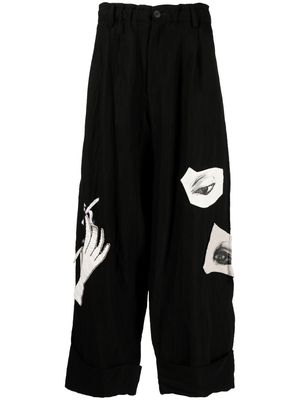 YOHJI YAMAMOTO appliqué-detailed wide-leg trousers - Black