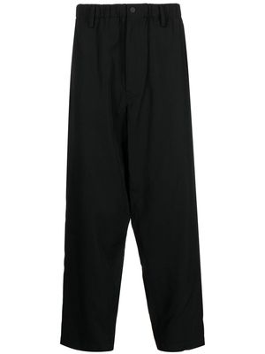 Yohji Yamamoto elasticated-waist tapered-leg trousers - Black