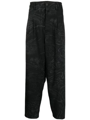 Yohji Yamamoto graphic-print slouchy trousers - Black