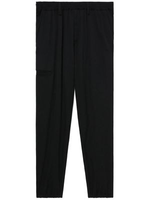 Yohji Yamamoto logo-patch wool trousers - Black