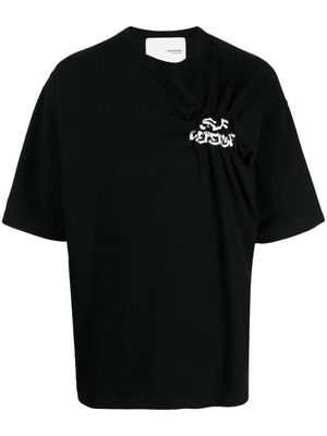 Yoshiokubo slogan-print cotton T-shirt - Black