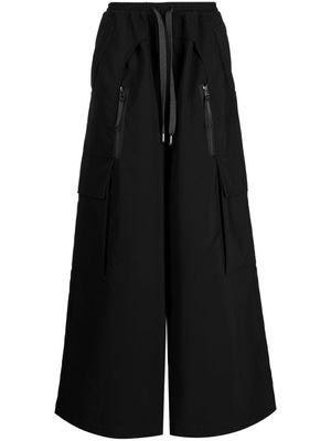Yoshiokubo Temple multiple-pocket trousers - Black