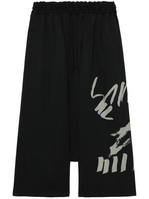 Y's Test Drawing-print wool cropped trousers - Black